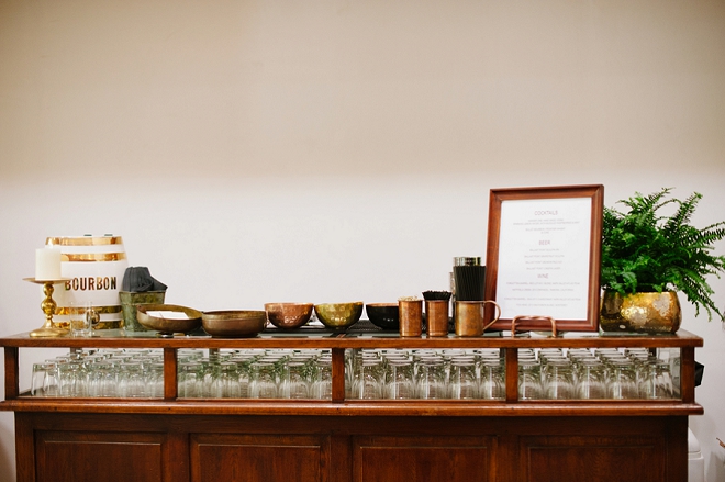 We love this super cute bourbon bar at this loft wedding!