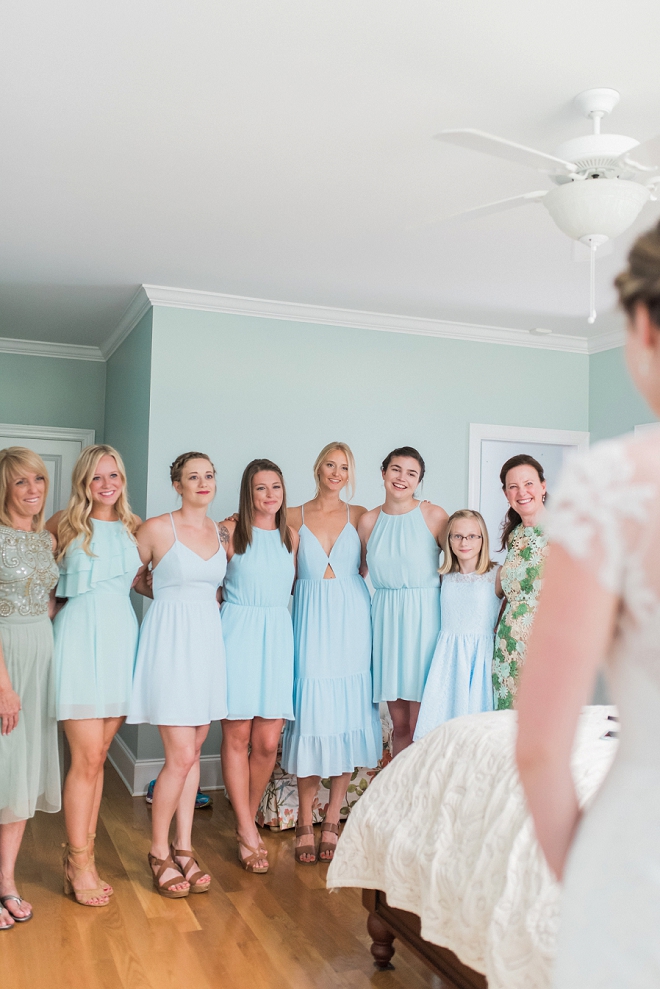 How sweet is this snap of the Bride showing her bridesmaid's her dress! LOVE!