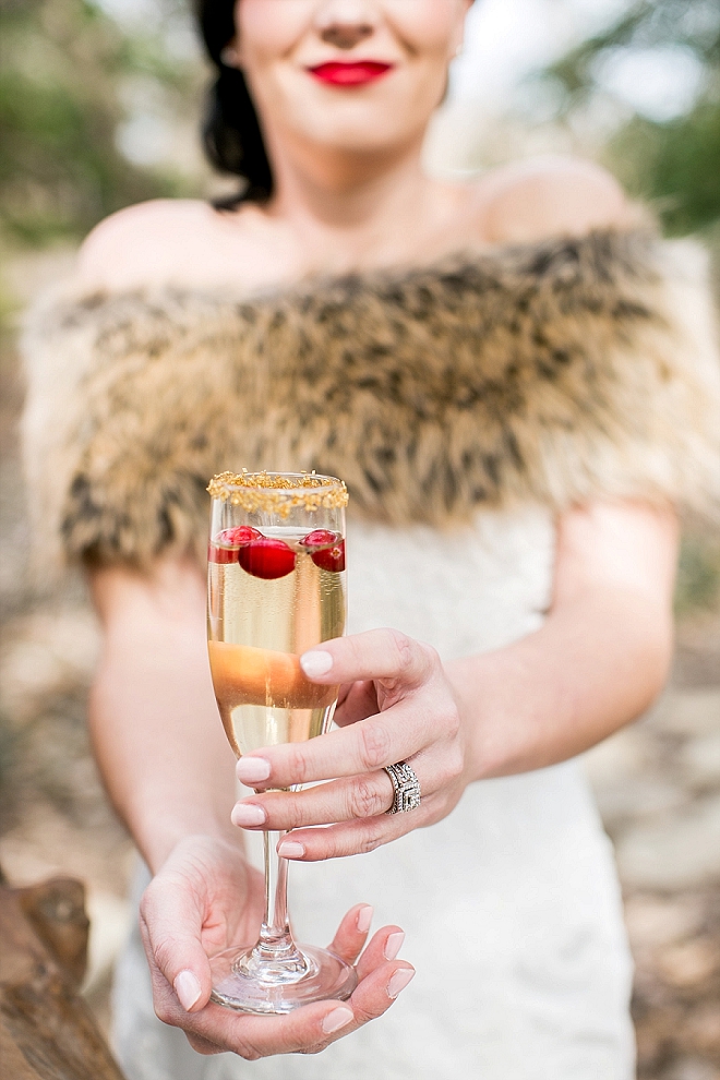 We love this champagne snap of the Bride at this stunning Snow White styled wedding!