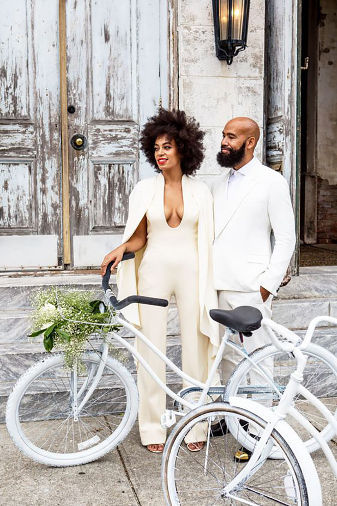 Channel Solange with a white cape a wedding cover up.