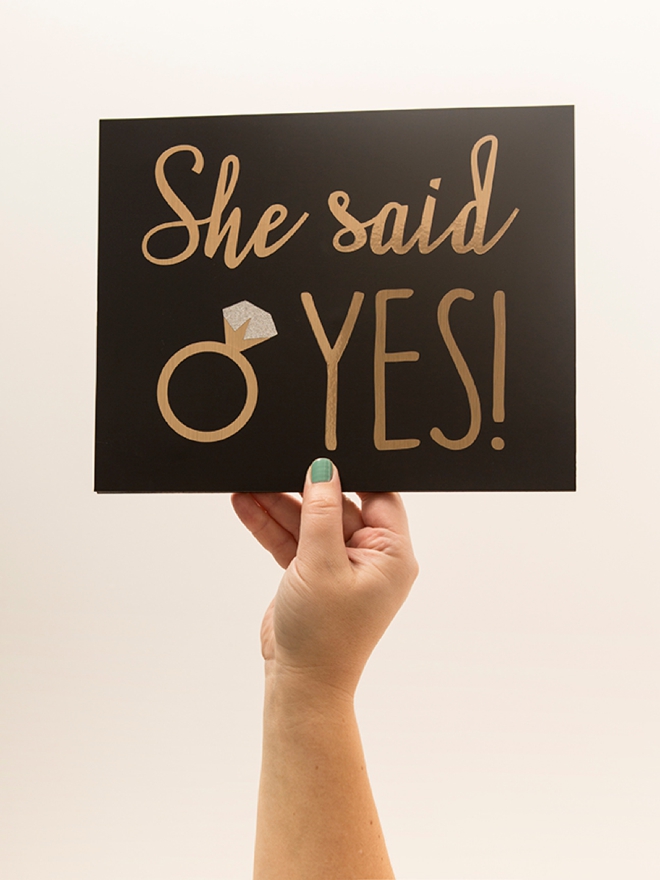 Learn how to quickly make a cute She Said Yes sign to bring along for your proposal!