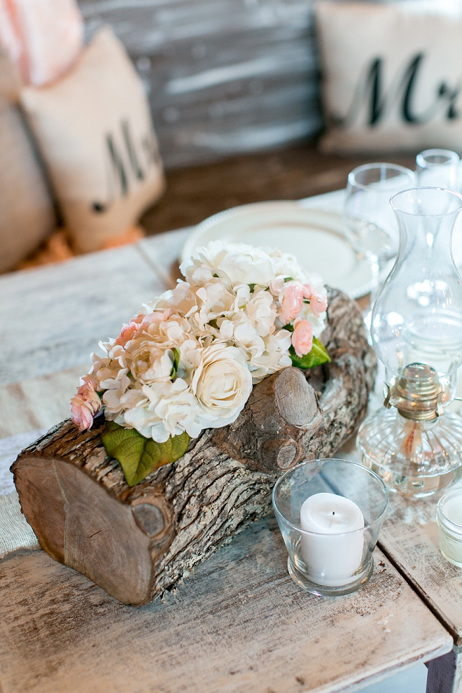 We love these floral and wooden centerpices!