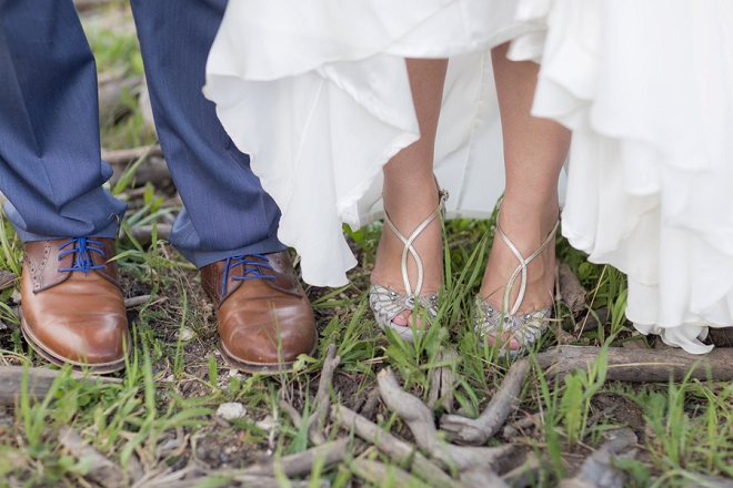 We love this sweet snap of the Bride and Groom's shoes!
