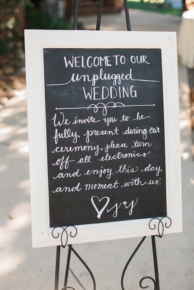 We love this Bride's unplugged ceremony sign!