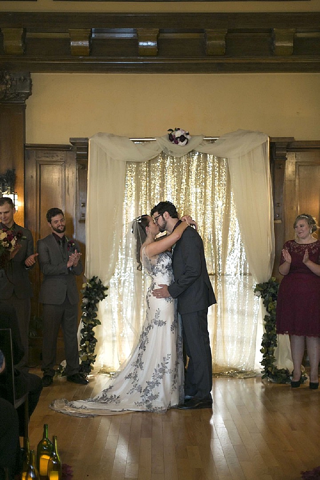 Sweet snap of the first kiss as Mr. and Mrs!