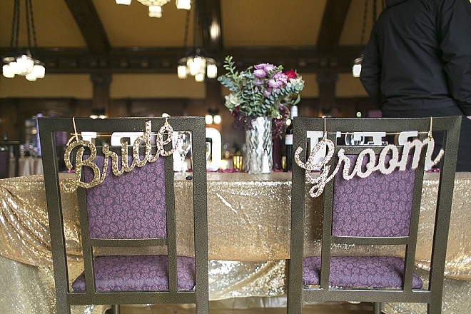 Darling Bride and Groom chair signs at their stunning sweetheart table!