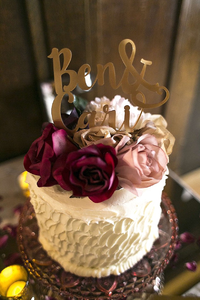 We're loving this darling cut cake and gold cake topper!