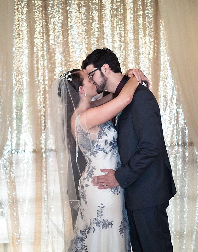 Sweet snap of the first kiss as Mr. and Mrs!
