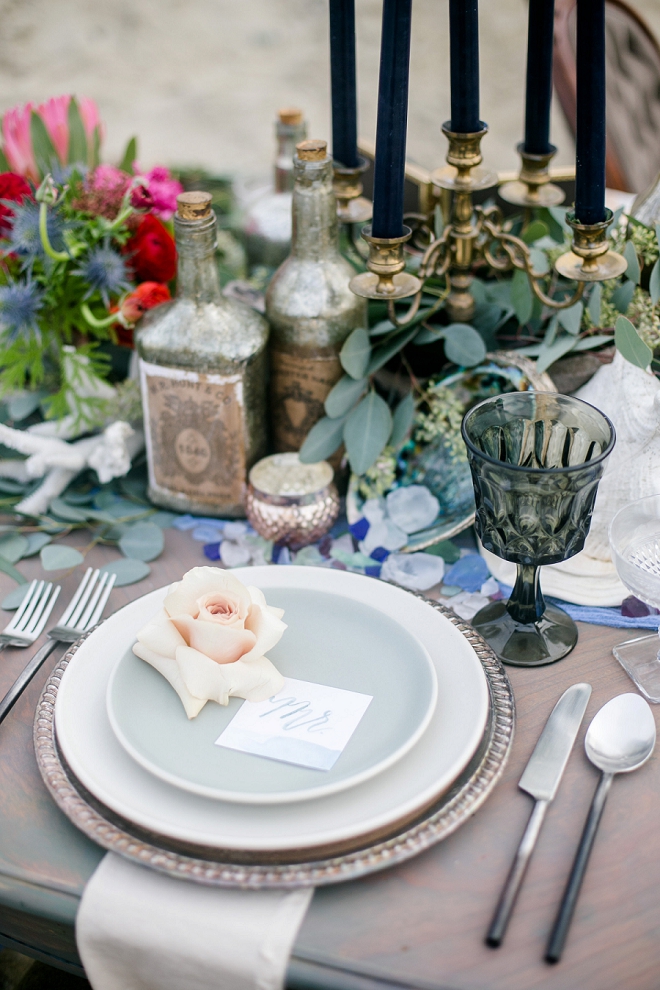 How dreamy is this table and table numbers at this styled beach wedding!