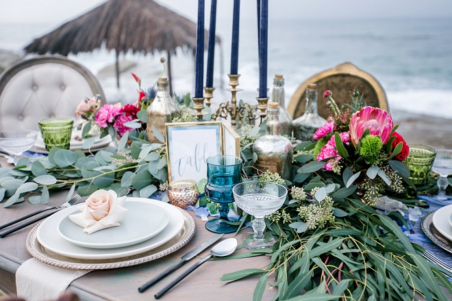 We love this dreamy tablescape set-up at this stunning styled beach wedding!