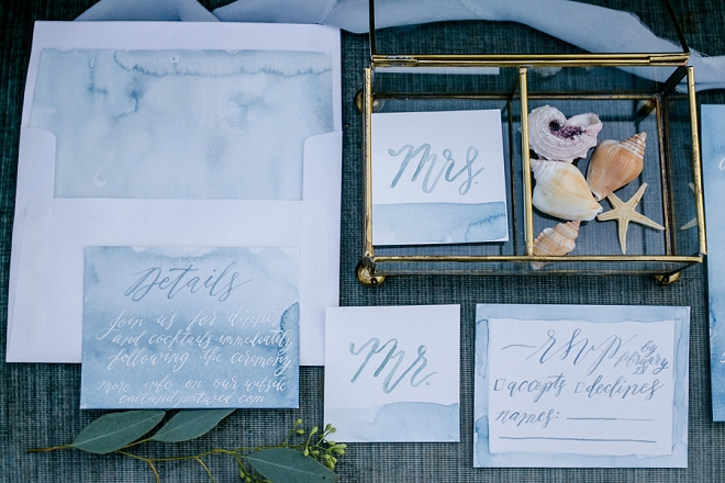 How stunning are these invitations at this styled moody mermaid beach wedding?! LOVE!