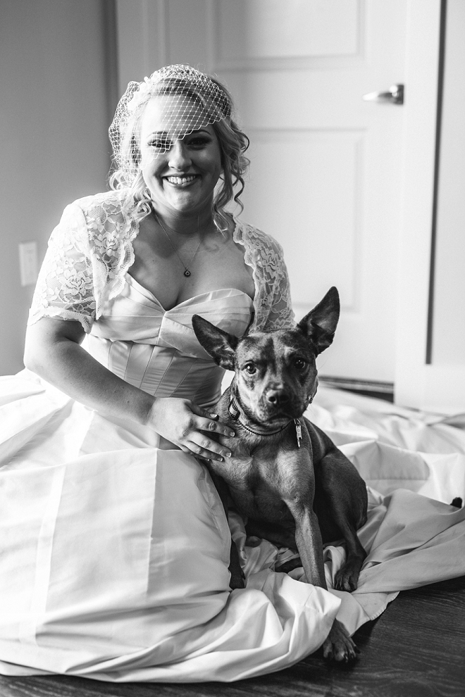 The stunning bride and her darling pup before the ceremony!