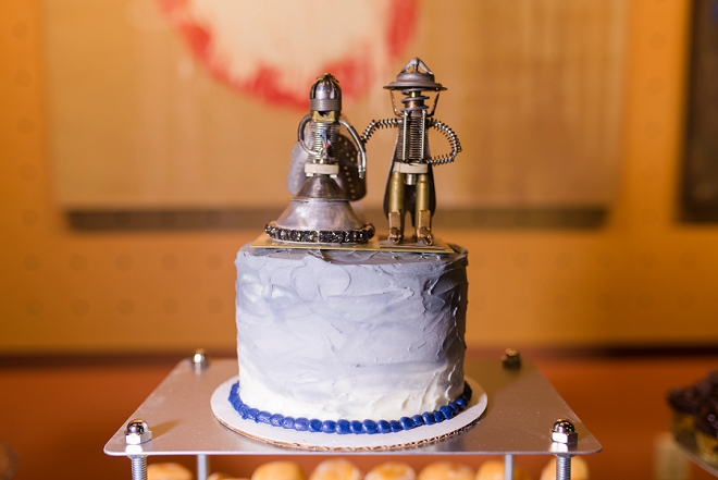 How cute are these cake toppers handmade by the couple's family!