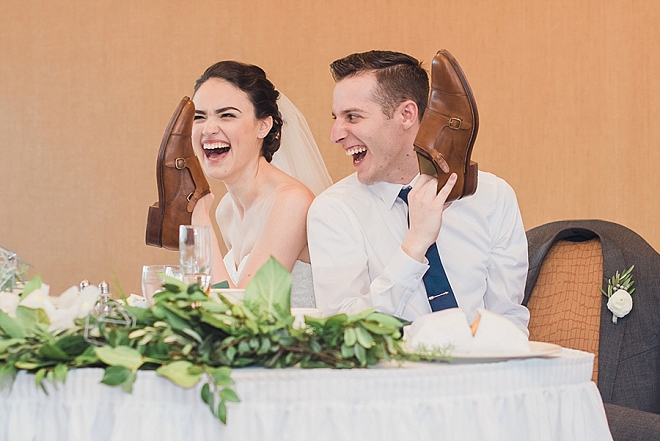 Such a fun snap of this new Mr. and Mrs at their reception!