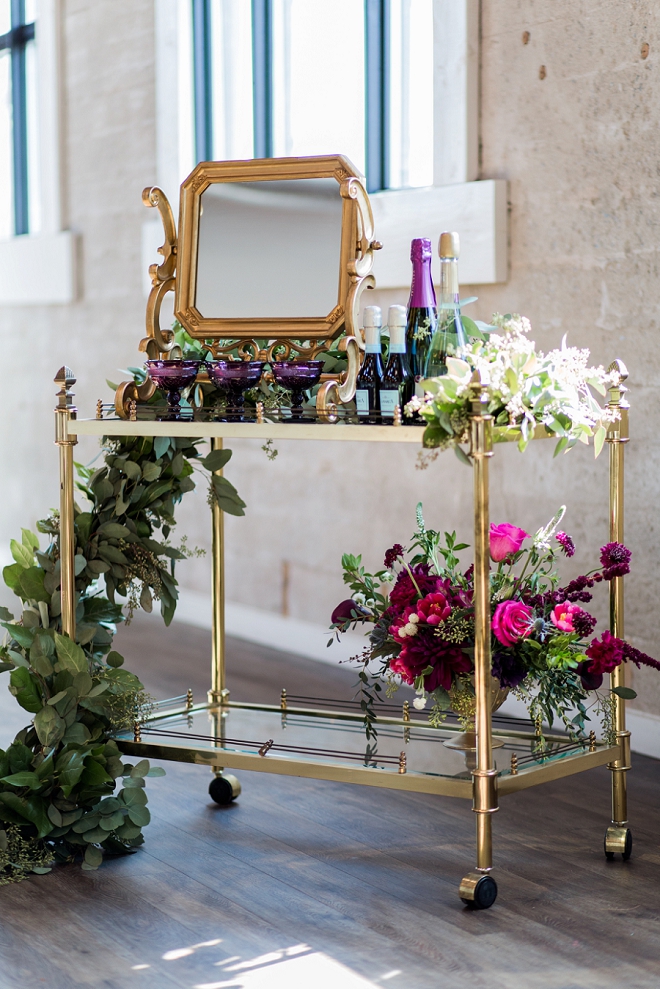 In love with this champagne bar cart perfect for this modern styled wedding!