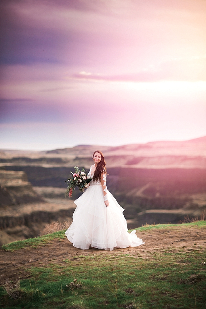 We are in LOVE with this Bride's long sleeved wedding dress at her styled anniversary shoot!