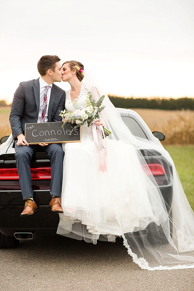 How fun is this couple and their styled shoot with her Groom's car?! Love it!