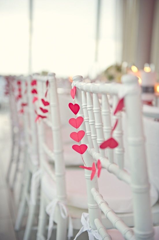 Just a little hint of romance with these darling chair garlands!