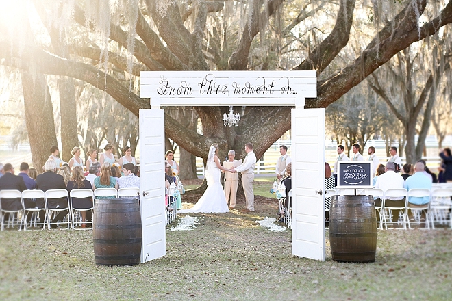 We're swooning over this stunning outdoor ceremony and gorgeous aisle decor!