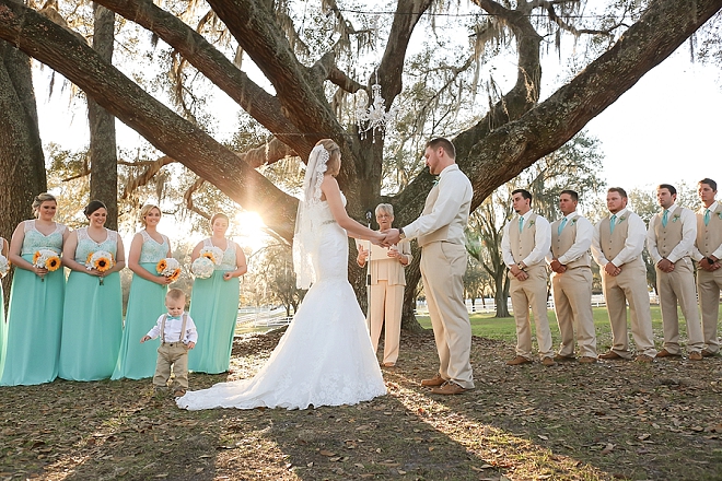 We're swooning over this stunning outdoor ceremony and gorgeous aisle decor!