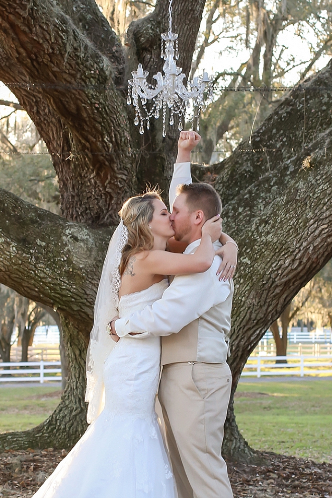 First kiss as Mr. and Mrs. at this stunning outdoor ceremony!