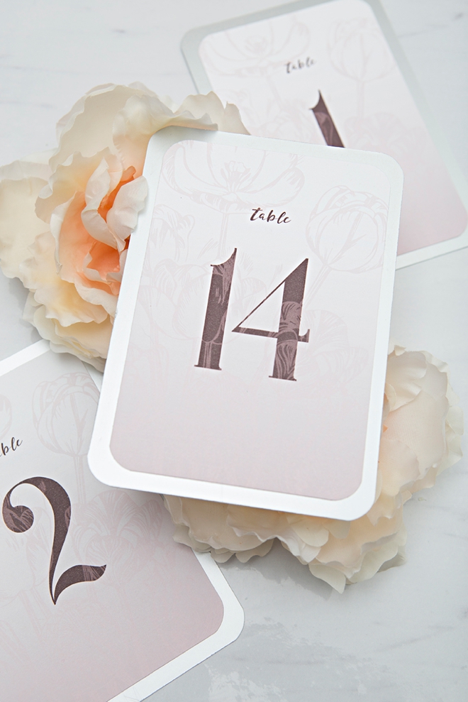 Download and print these pink floral table numbers now for free!