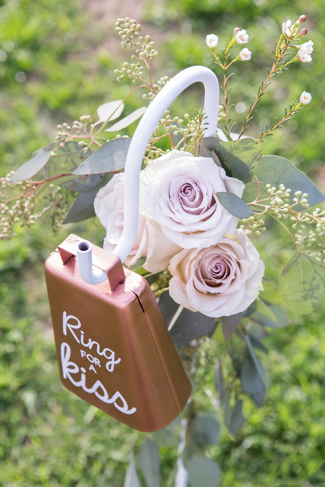 Learn how to make this darling Ring For A Kiss Cowbell for your wedding reception!