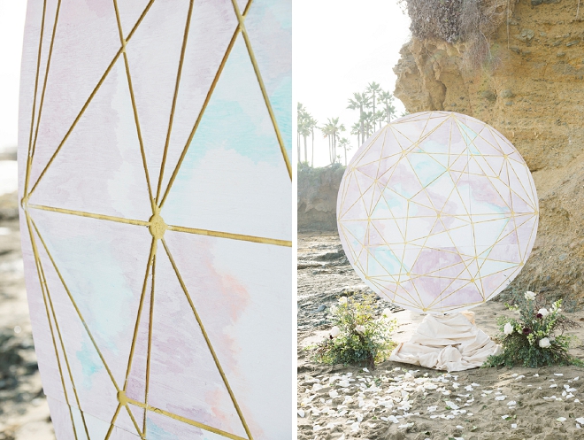 Check out this amazingly cool paper moon globe this couple used as their backdrop! LOVE!