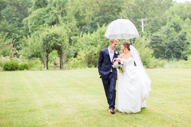 We're crushing on this snap of this darling couple and their rainy day wedding!