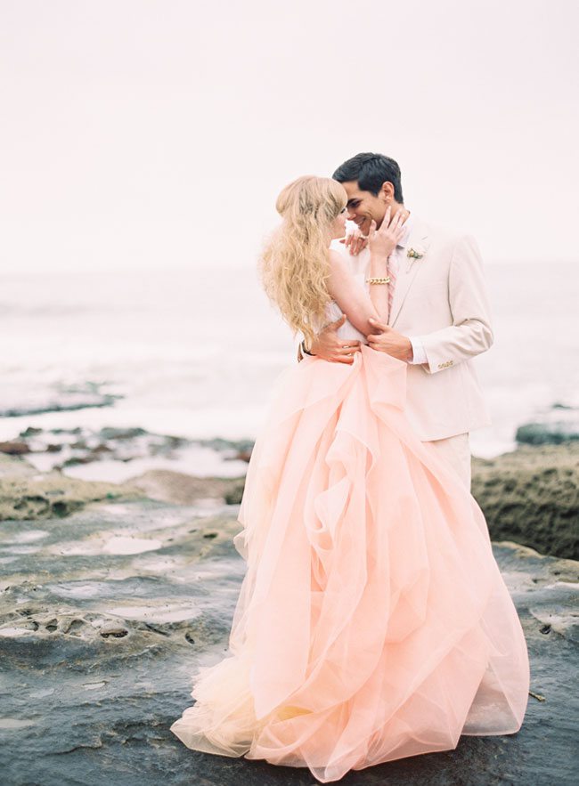 How AMAZING is this blush pink wedding dress?! We're in LOVE!
