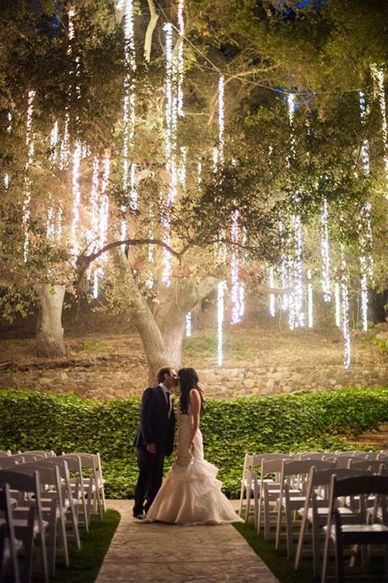 These twinkle lights are so romantic! Love this idea for a spring wedding.