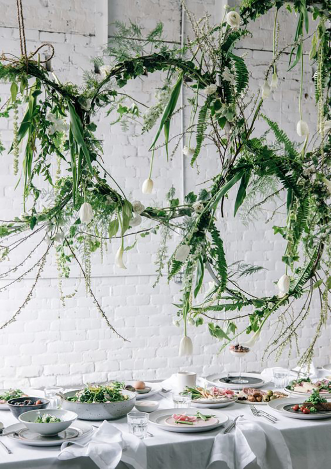 Floating wreaths add a magical touch of greenery.