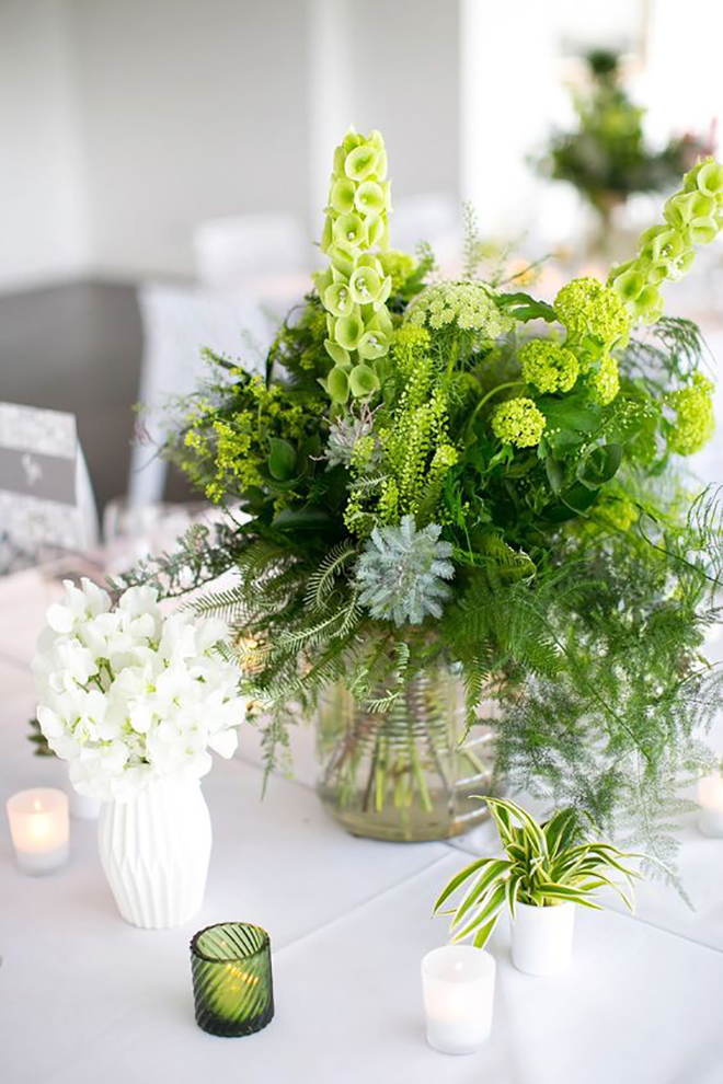 Layer greenery colors to make a statement centerpiece.
