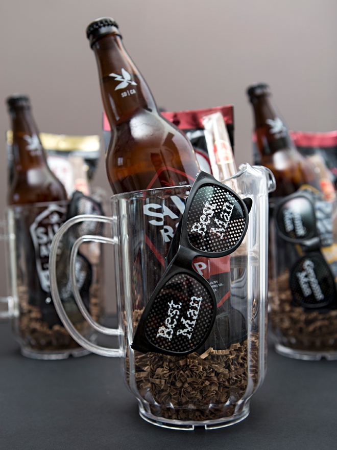 Give your groomsmen their gifts in a large beer pitcher, so fun!