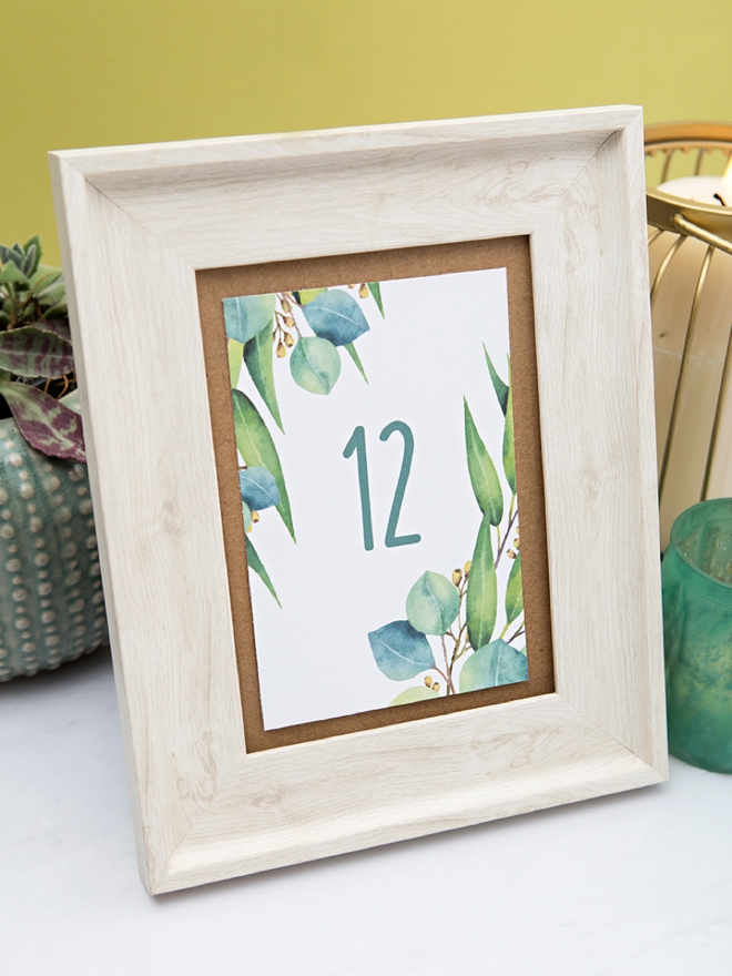 Darling free printable table numbers with a eucalyptus theme!