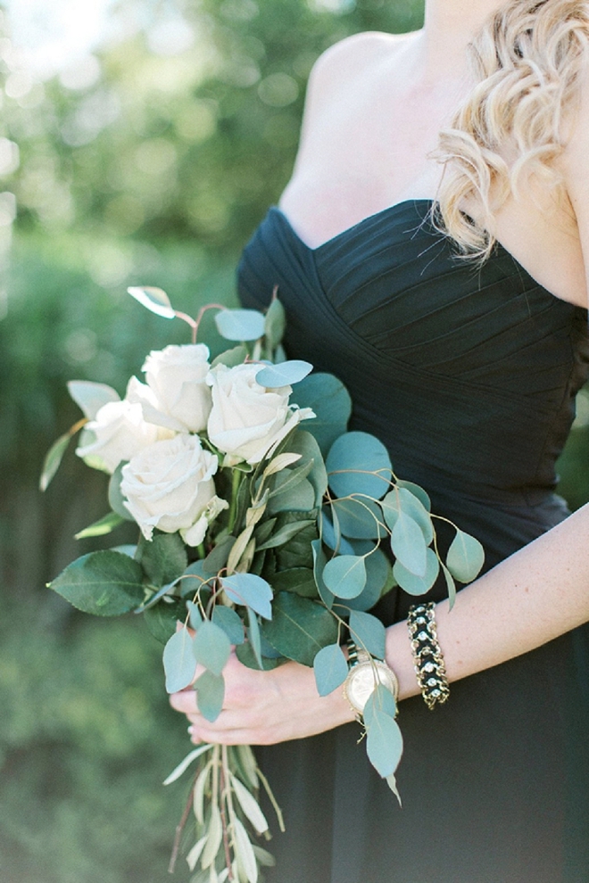 We're loving these Bridesmaid's style with black dresses and greenery bouquet!