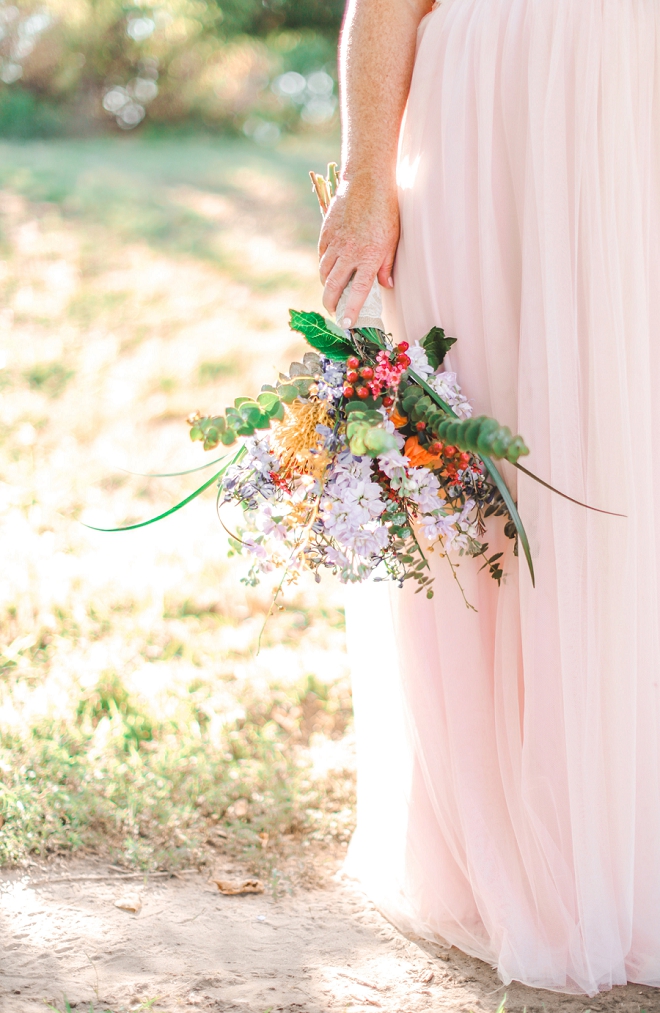 We're LOVING this Bride's blush toned wedding dress!