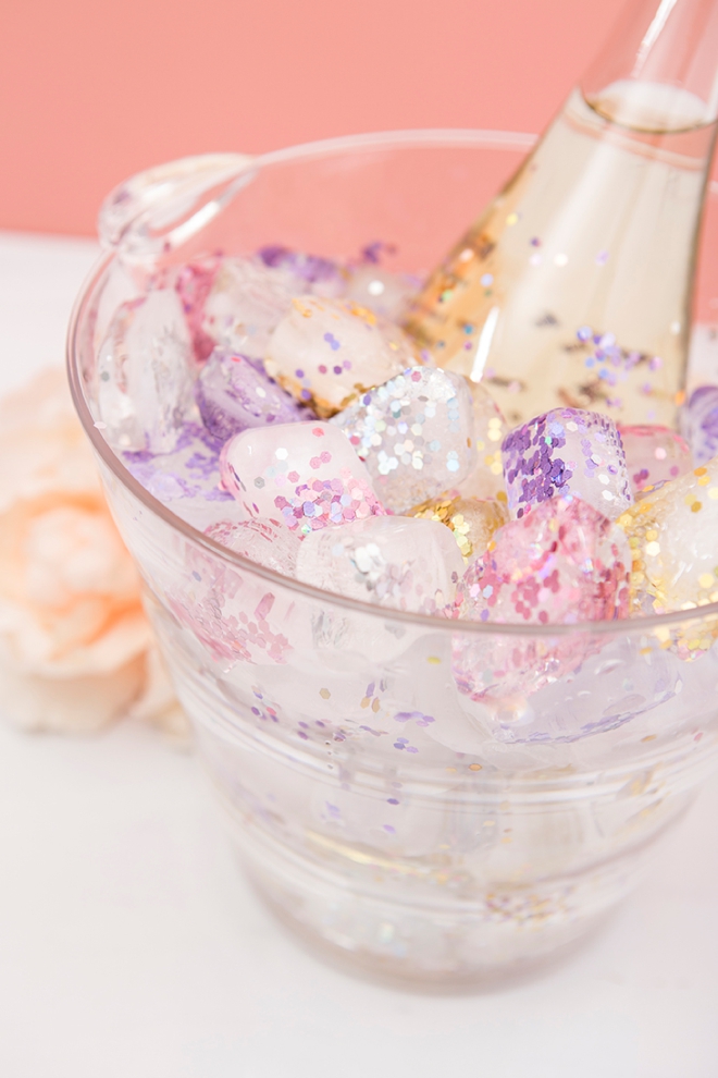 Learn how to make glitter ice cubes, PERFECT for a clear ice bucket!