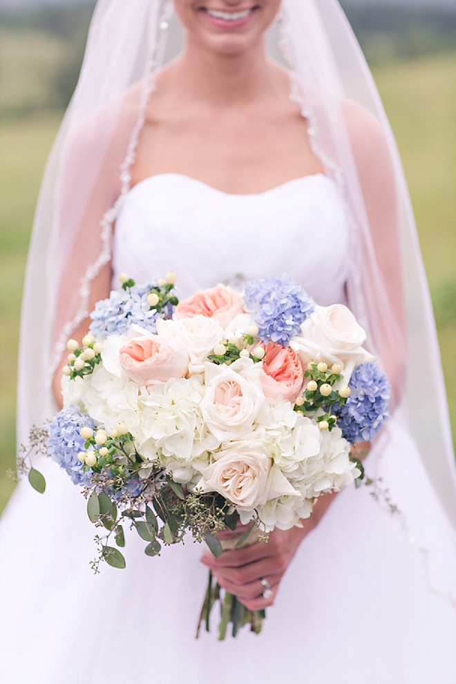 Loving this bright and springy handmade bouquet at this southern wedding!