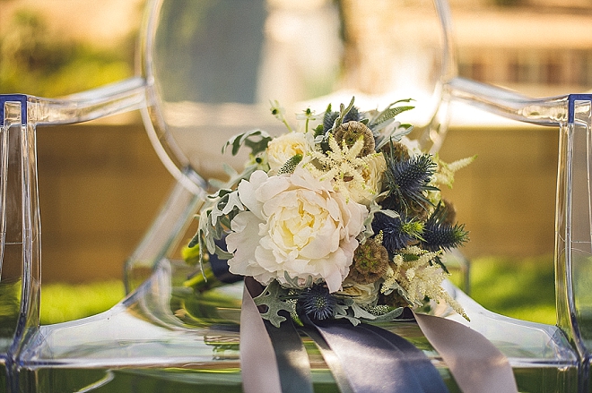 Loving this white and green boho chic bouquet at this styled wedding!