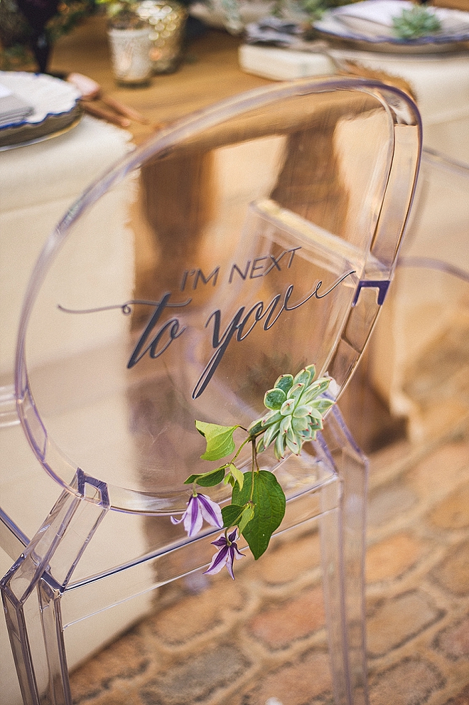 We're in LOVE with these ghost chairs with lettering on the back for your reception!