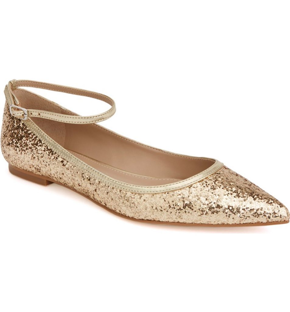 Glittery gold sparkle flats with an ankle strap. So cute! 