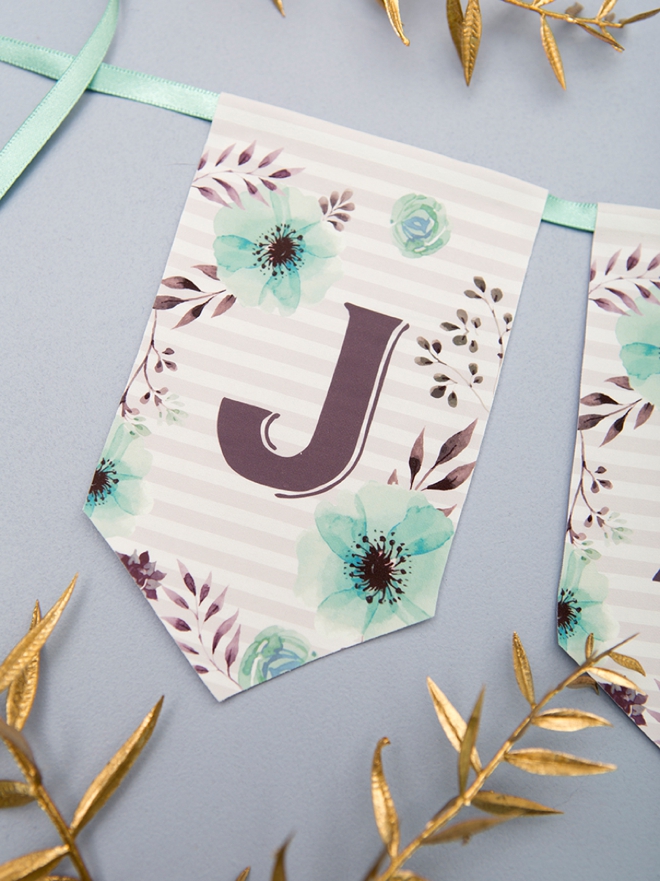 This adorable alphabet banner is free to print and the design was ironed onto fabric!