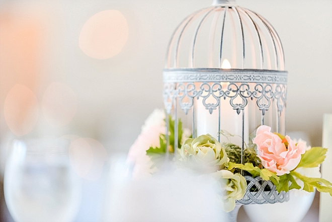 Check out these darling centerpieces and table numbers with vintage birdcages!