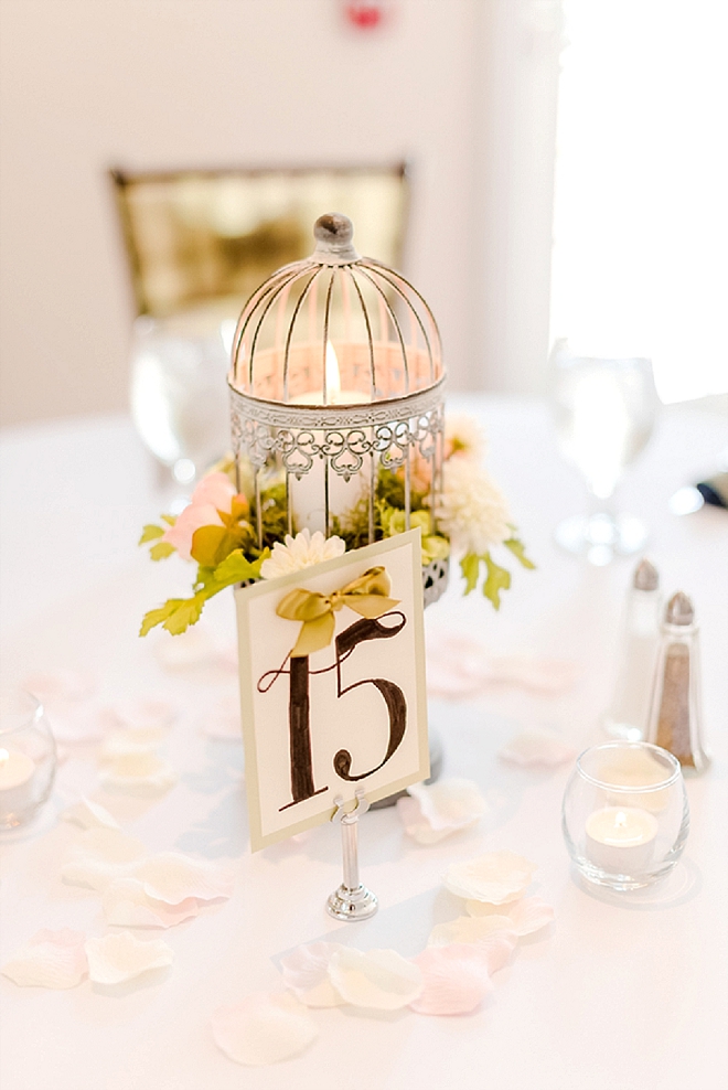 Check out these darling centerpieces and table numbers with vintage birdcages!