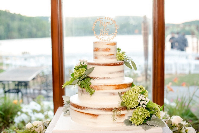Check out this simple and stunning wedding cake with wooden cake topper!