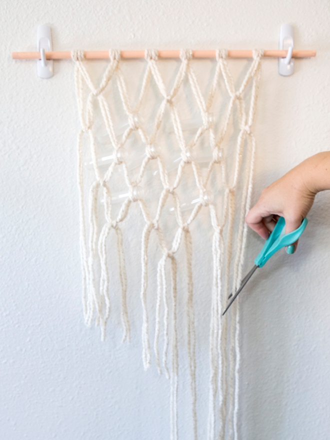 We're obsessing over these DIY yarn macramé wedding reception chairs!