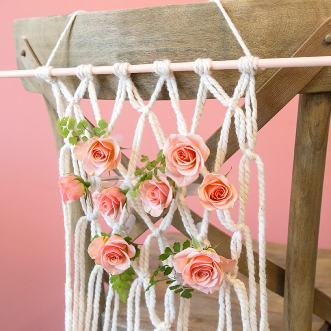 We're obsessing over these DIY yarn macramé wedding reception chairs!