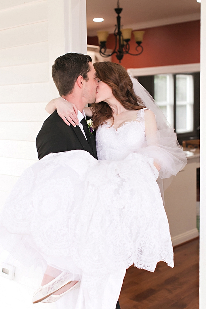 How adorable!! This Groom carried his Bride over the threshold of their home!