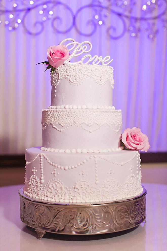 Check out this gorgeous white and pink rose wedding cake!
